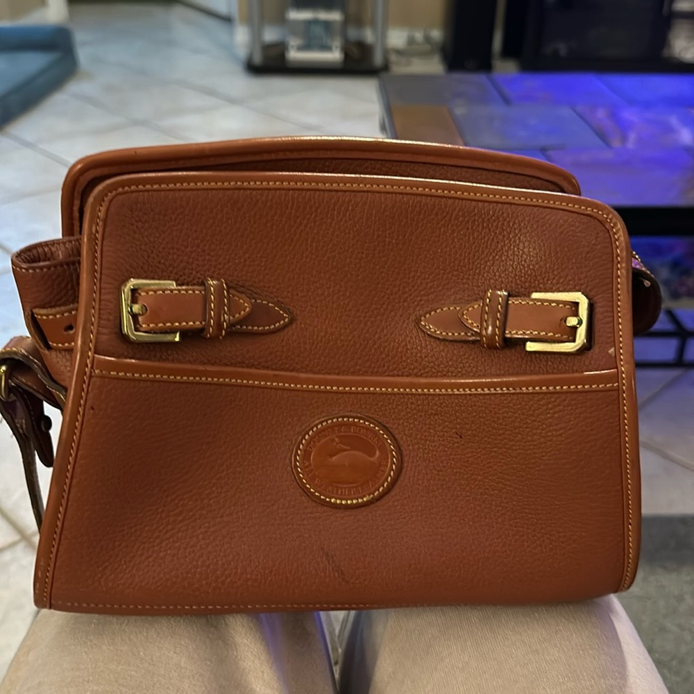 Brown Dooney Bourke small purse.